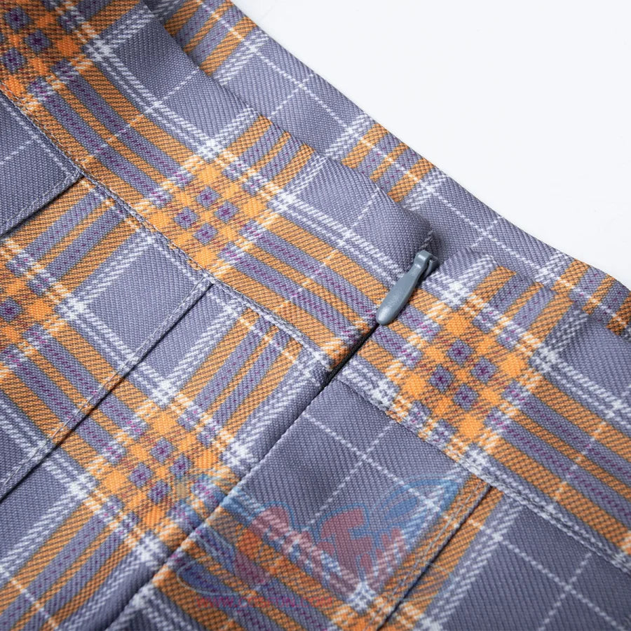 Close-up of the JK plaid skirt zipper frames gray-yellow check fabric across a stitched waistband and pleats.