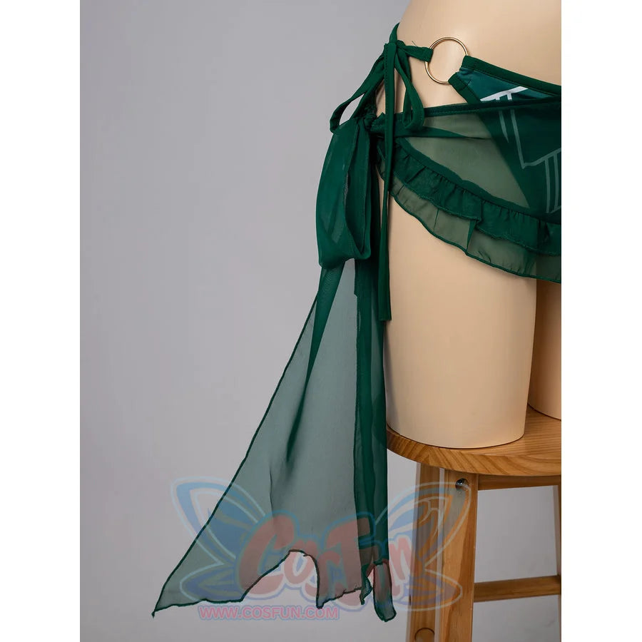 Jolyne Cujoh cosplay bikini side sash detail sets sheer green fabric below a gold-tone ring.