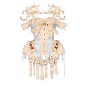 Flat lay of a cream lace bodice with blue center panel, bows, buttons, and ribbon streamers