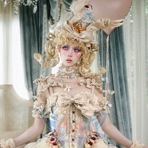 Portrait styling of the cream Rococo corset top with ruffled neckline and cherry details