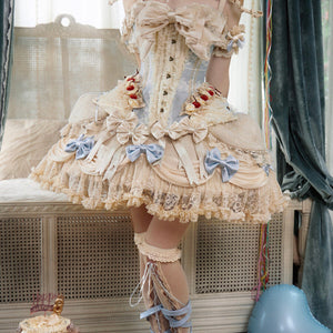 COSFUN centered main view of a cream Rococo Lolita lace cake skirt with blue bows and layered ruffles