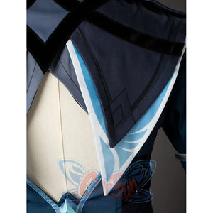 Lumine cosplay back shoulder detail layers navy and white panels with turquoise edging.