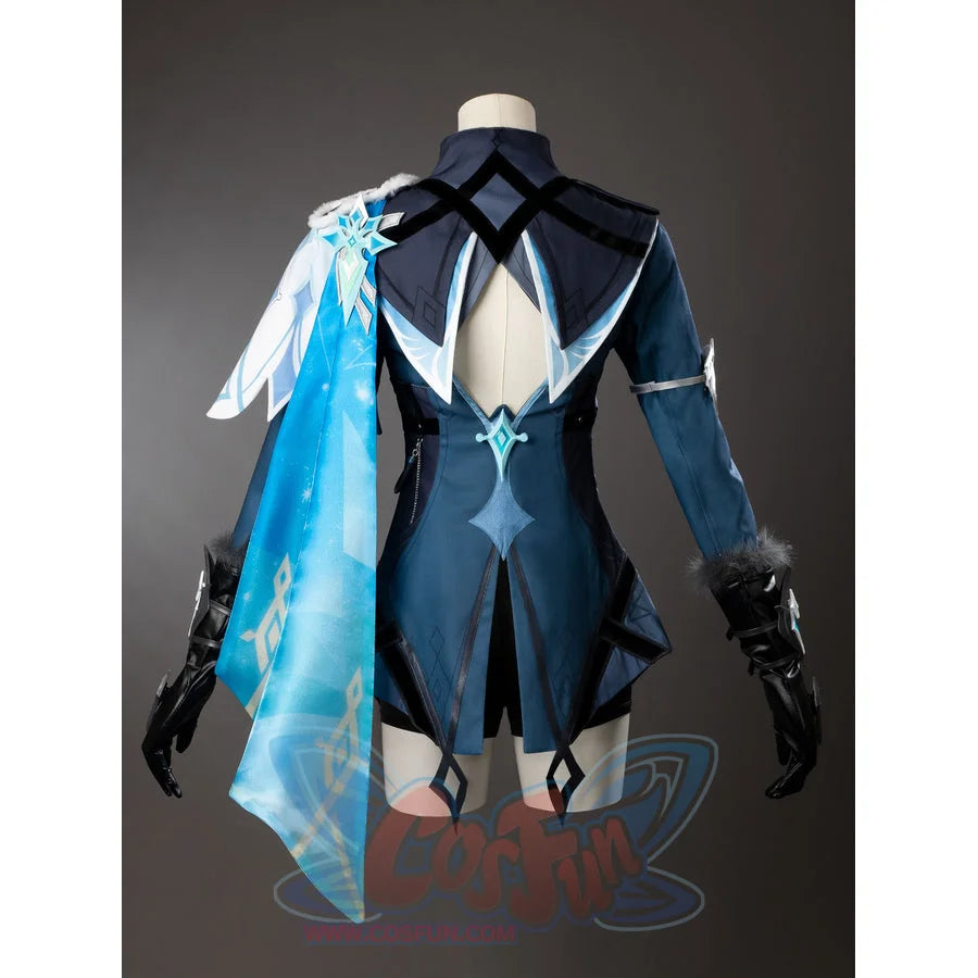 Lumine cosplay costume back view with an open-back panel and layered pale and turquoise drapes.
