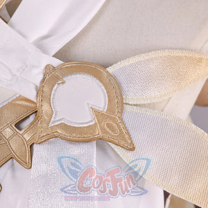 Close-up of Genshin Impact Lumine cosplay costume shoulder accessory with gold frame, white inset, and cream fabric