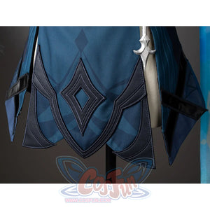 Lumine cosplay front hem detail with layered pointed dark teal panels and blue geometric stitching.