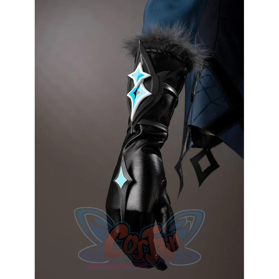 Lumine cosplay glove detail with a silver-tone turquoise ornament and gray fluffy cuff trim.