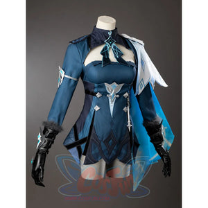 Lumine cosplay outfit angled view pairs a pale shoulder drape with a dark teal bodice above layered pointed panels.