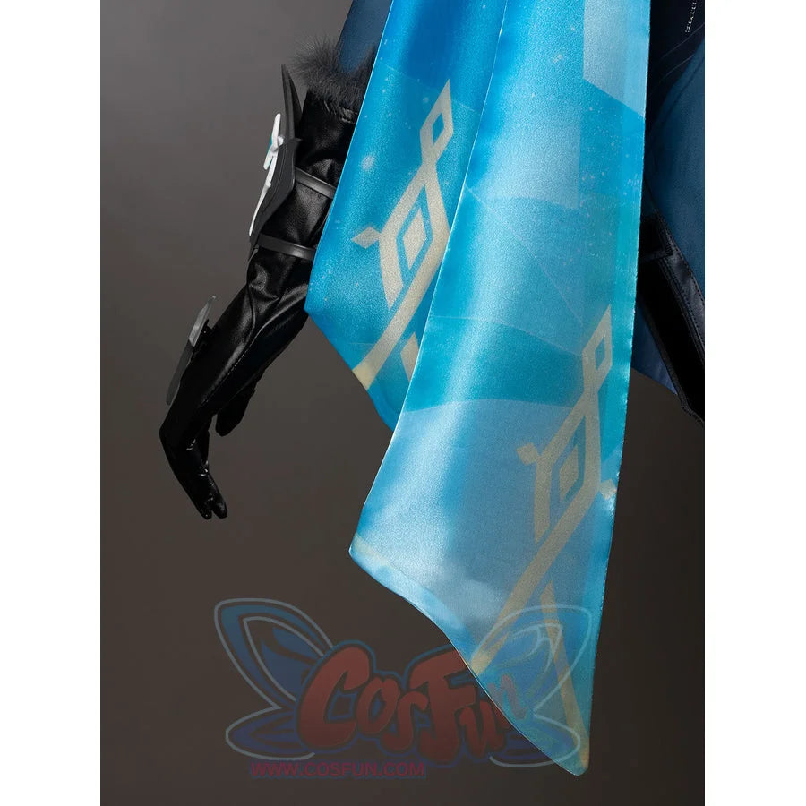 Lumine cosplay turquoise drape detail with a pale geometric pattern over translucent blue fabric.