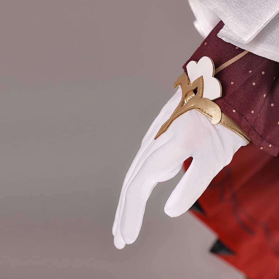 Genshin Impact Marionette Sandrone old design cosplay costume frames the white glove and gold-tone arm ornament detail.