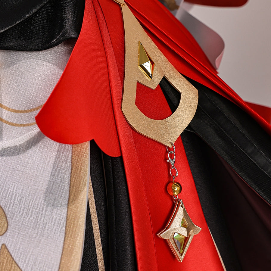 Genshin Impact Marionette Sandrone old design cosplay costume centers a gold-tone pendant over layered red fabric panels.