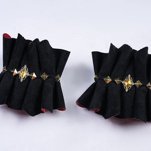 Genshin Impact Marionette Sandrone old design cosplay costume sleeve rings gather fabric beneath gold-tone pyramid studs.