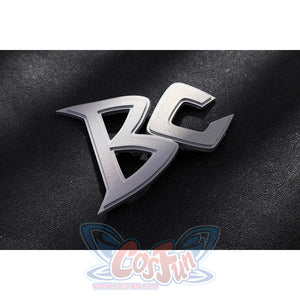 Marvel Rivals Black Cat Felicia Hardy cosplay BC logo detail rests in silver-tone metal on black fabric.
