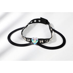 Marvel Rivals Black Cat Felicia Hardy cosplay necklace flat lay places a gem-like pendant on black straps.