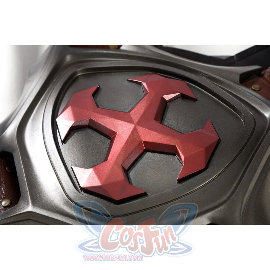 Masters of the Universe He-Man cosplay chest emblem close-up highlights the red cross set into gray armor