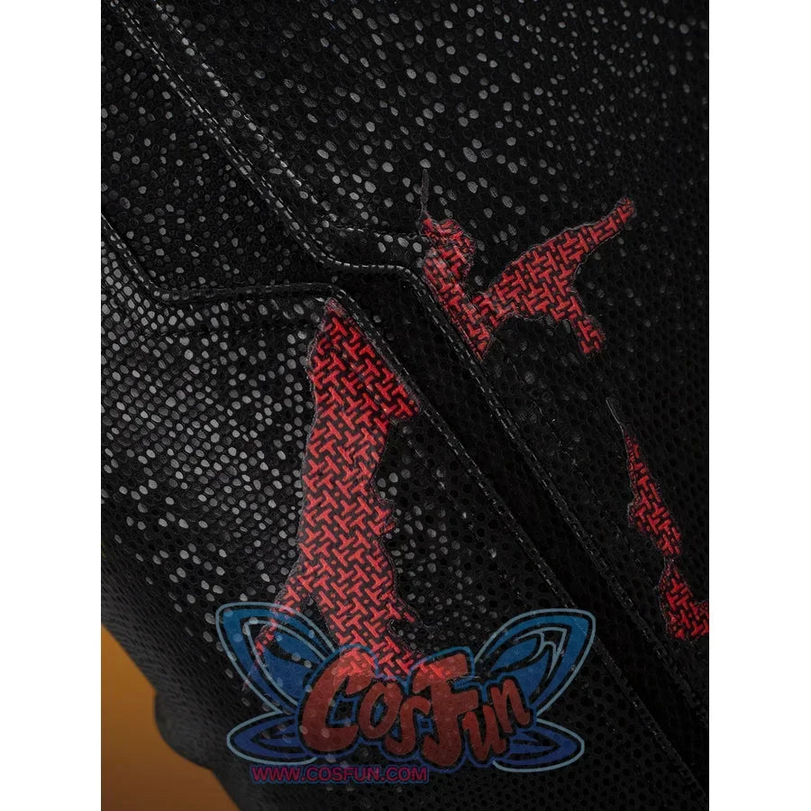 Matt Murdock cosplay costume seam close-up crosses textured black panels with distressed red stitching.