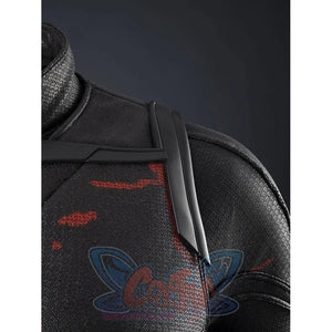 Matt Murdock black cosplay bodysuit frames a rugged shoulder armor piece with red textured patterns layered onto fabric.