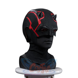 Matt Murdock cosplay helmet side view curves red horn accents across a black textured shell and neck hood.
