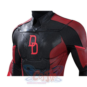 Matt Murdock cosplay costume chest panels layer glossy black armor shapes beside red shoulder fabric.