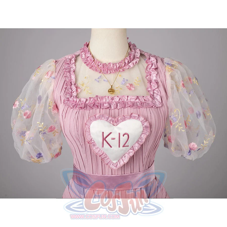 Melanie Martinez K-12 Cry Baby cosplay bodice frames the heart bib below floral sheer sleeves.