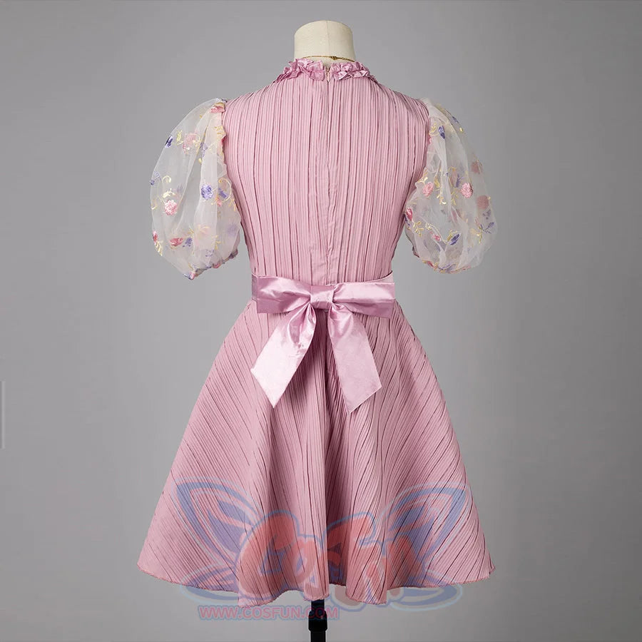 Melanie Martinez K-12 Cry Baby cosplay dress back view ties a satin bow over a pleated pink bodice.