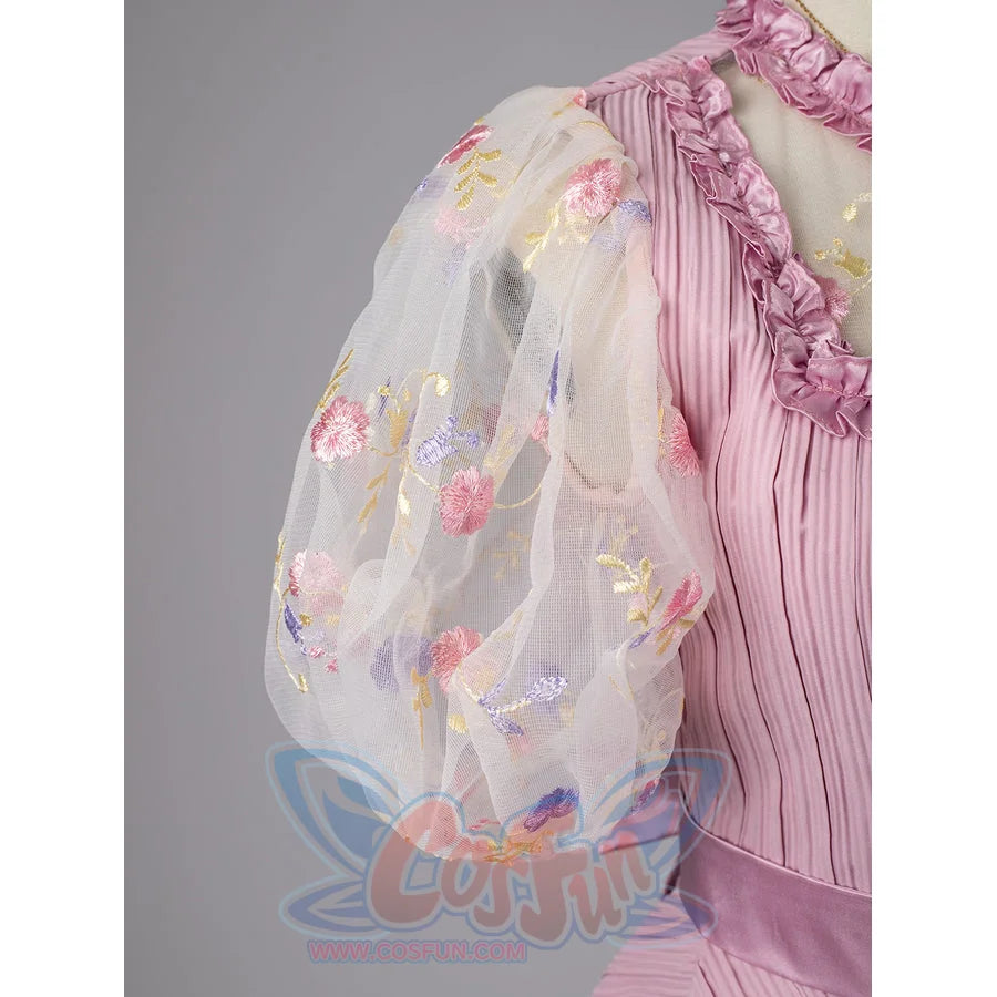 Melanie Martinez K-12 Cry Baby cosplay sleeve detail layers floral sheer mesh beside pink ruffle trim.