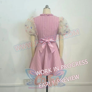 Melanie Martinez K-12 Cry Baby cosplay pink dress back view places a satin bow beneath sheer floral puff sleeves