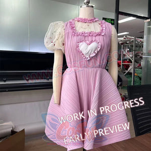 Melanie Martinez K-12 Cry Baby cosplay pink dress close-up highlights the ruffled neckline and flared pleated skirt