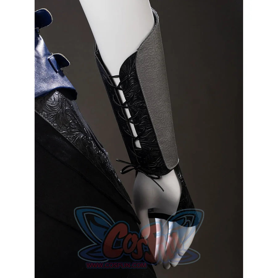 Mortal Kombat 2 Kitana cosplay arm guard close-up threads black lacing beside a silver forearm panel.