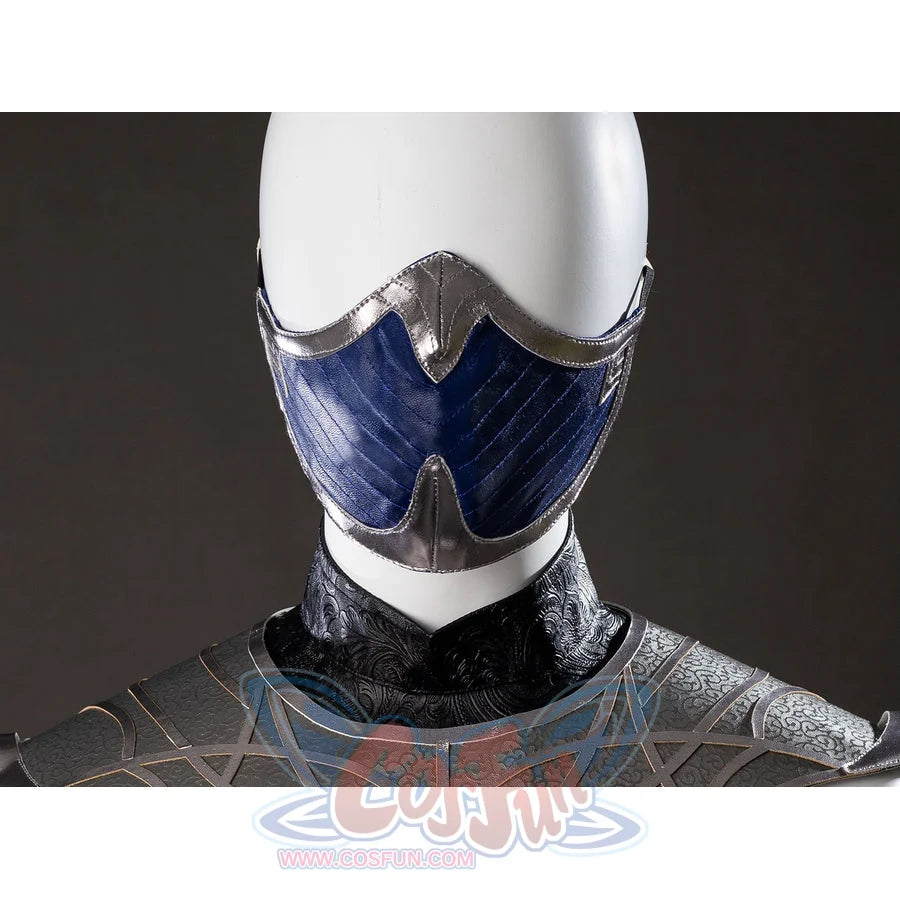 Mortal Kombat 2 Kitana cosplay mask close-up sets blue panels under silver trim and black collar.