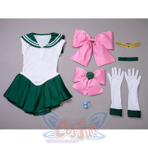 Makoto Kino cosplay costume flat lay gathers two large pink bows beside white gloves and a gold tiara with green trim.