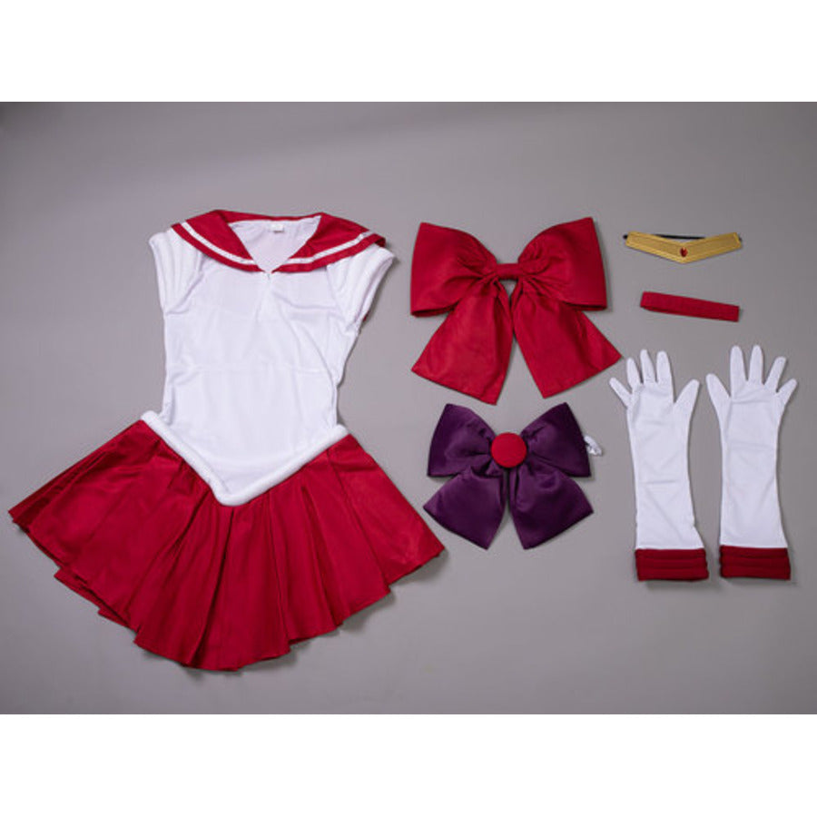 Sailor Mars Rei Hino 1st Gen cosplay dress anchors two red bows and pairs white gloves with a gold tiara and red choker.