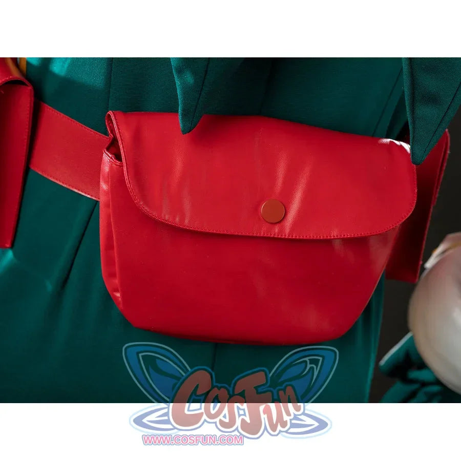My Hero Academia Deku cosplay rear pouch close-up rests a red snap bag against dark green fabric.