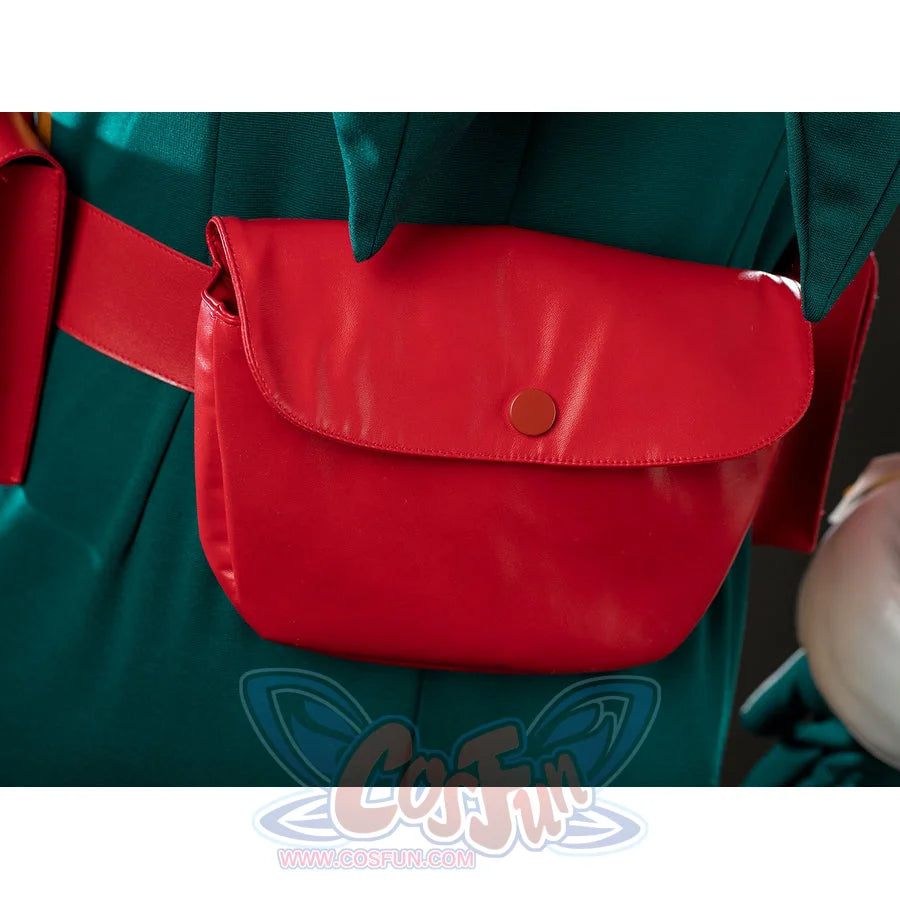 My Hero Academia Deku cosplay rear pouch close-up rests a red snap bag against dark green fabric.