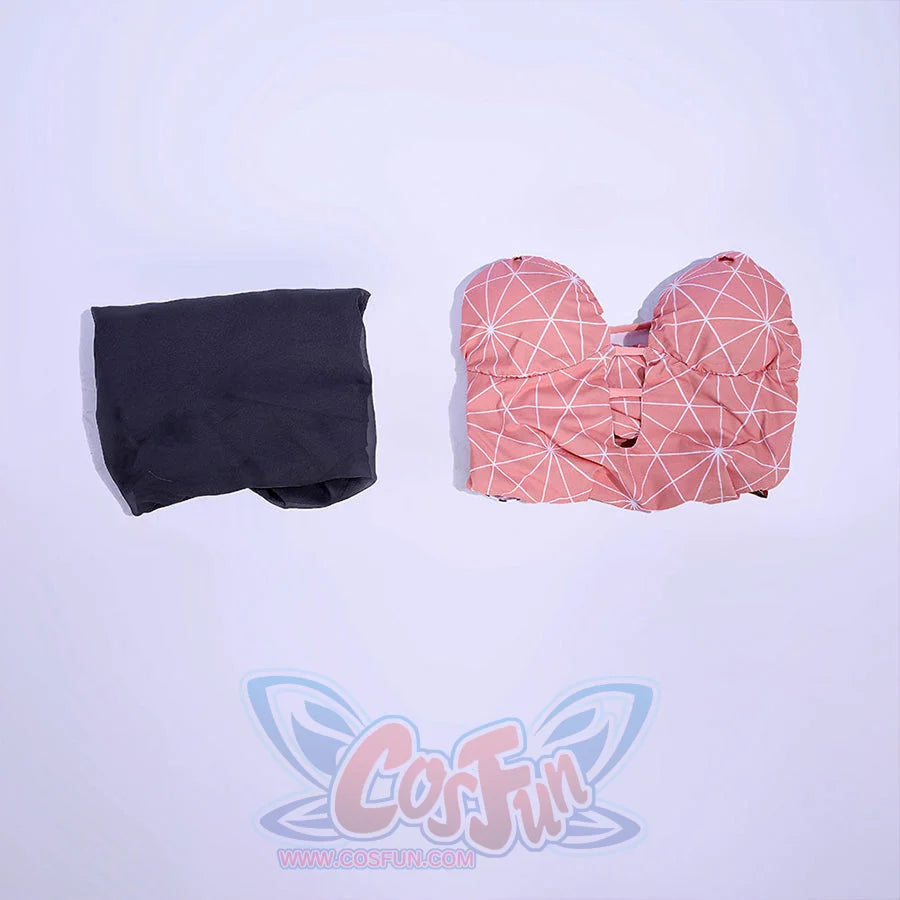 Nezuko cosplay swimsuit flat lay showing a folded grey sheer cover-up and pink patterned swimsuit top