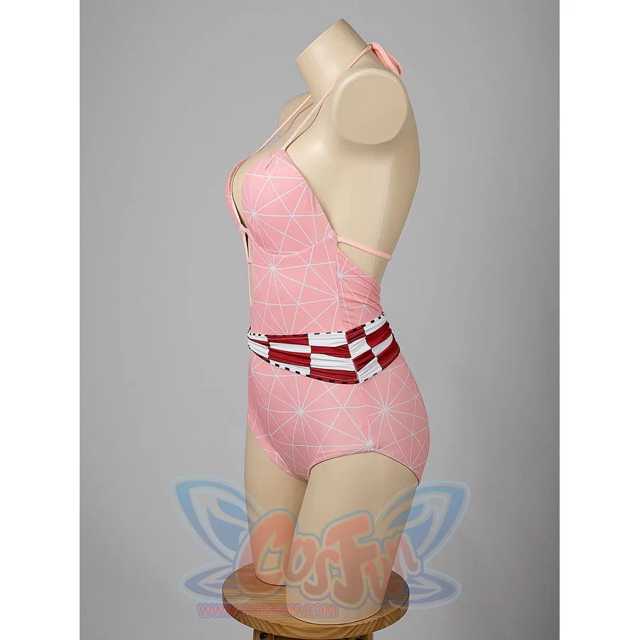 Nezuko cosplay swimsuit side view sets the pink bodysuit under slim halter straps.