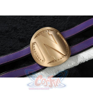 Close-up of Nico Robin cosplay costume arm band with purple straps, white fringe, and round gold N medallion