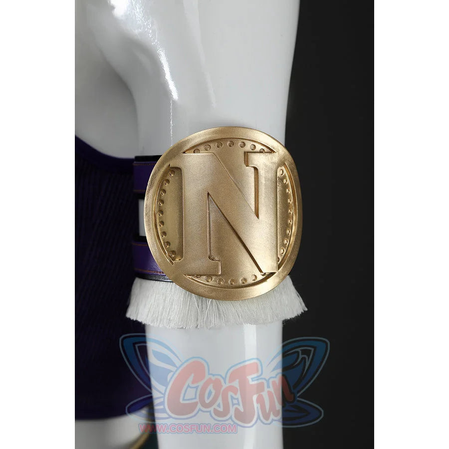 Close-up of Nico Robin cosplay costume arm ring with purple band, white fringe, and round gold N medallion