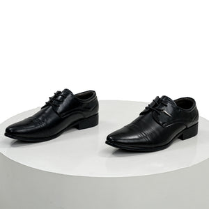 Final Fantasy XV Noctis The Chosen King cosplay shoes crafted from matte black faux leather beside a classic derby profile.