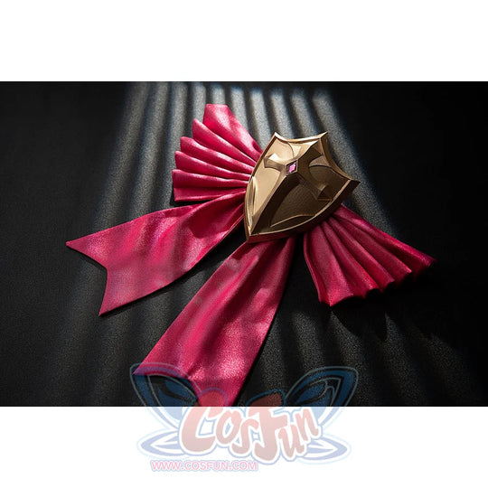 Genshin Impact Noelle cosplay back bow flat lay pairs pleated pink fabric with a gold-tone shield accent.