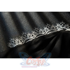 Genshin Impact Noelle cosplay black lace fabric swatch shows delicate floral edging over dark cloth.