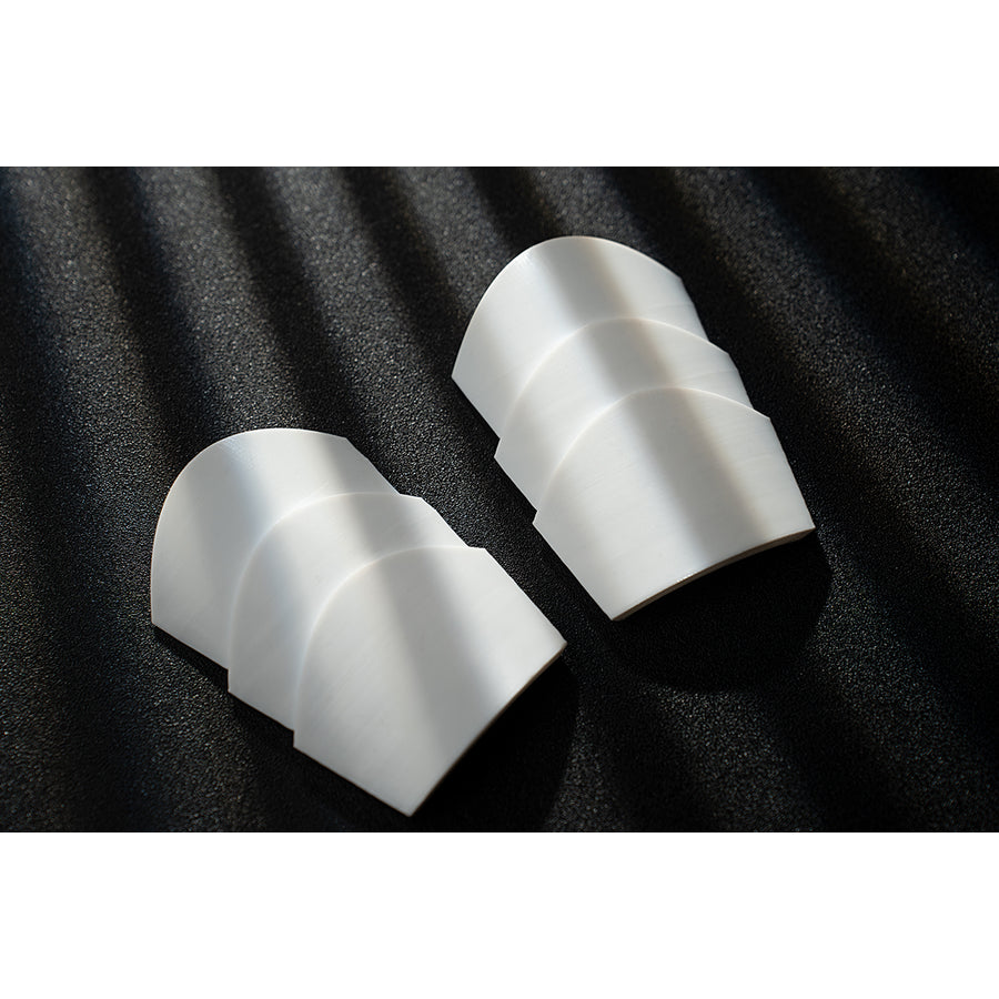 Genshin Impact Noelle cosplay knee pads pair matching white curved pieces for the leg accessories.