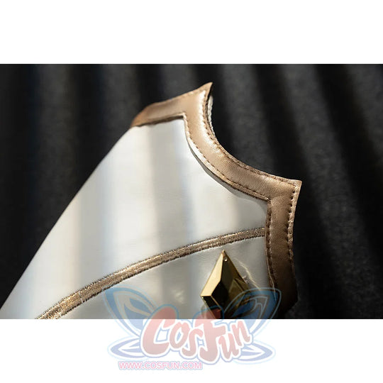 Genshin Impact Noelle cosplay leg guard edge detail shows white armor shaped with gold piping.