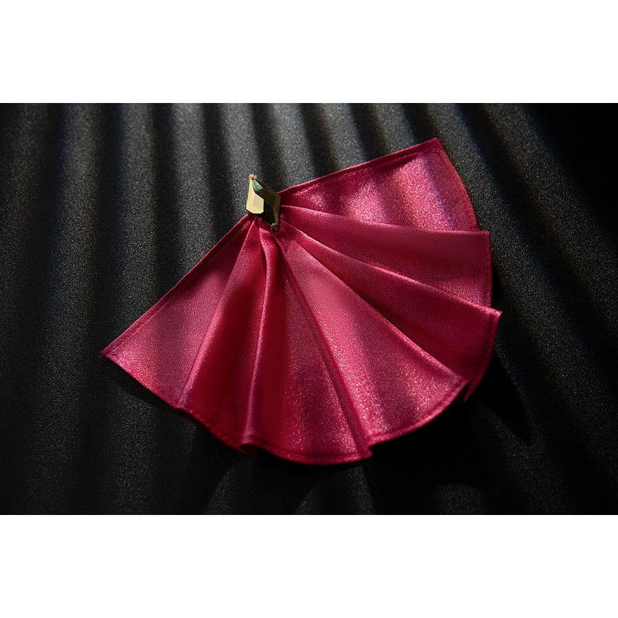 Genshin Impact Noelle cosplay waist bow flat lay shows pink satin folds and gold-tone tips.
