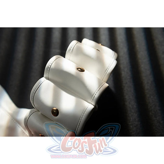 Genshin Impact Noelle cosplay wrist guard detail shows white armor plates finished with gold buttons.