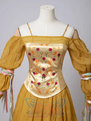 Star Wars Padme Amidala cosplay corset detail centers rose embroidery above the gathered yellow skirt.