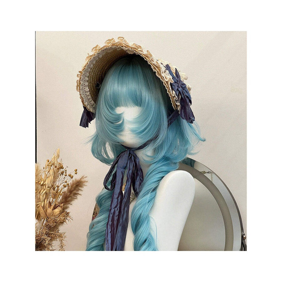Side view of peacock teal blue lolita wig in medium-length wavy bob style, accessorized with a straw hat with lace trim and navy blue ribbon, displayed on a white mannequin bust