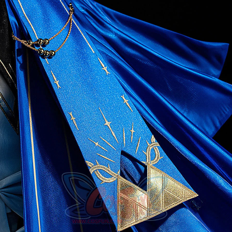 Wuthering Waves Phoebe cosplay cape detail pairs blue satin folds with a gold-tone geometric ornament