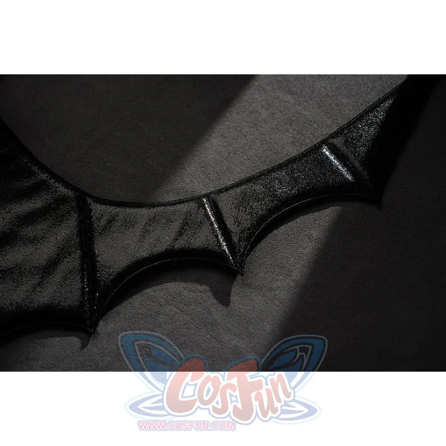 Wuthering Waves Phrolova cosplay bat-wing trim detail shows black pointed edging and stitch lines.