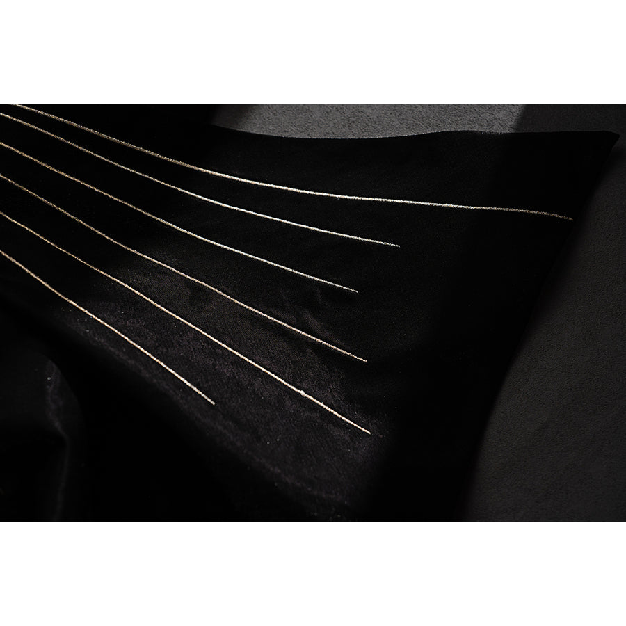 Wuthering Waves Phrolova cosplay skirt panel detail features thin gold stripes over black fabric.