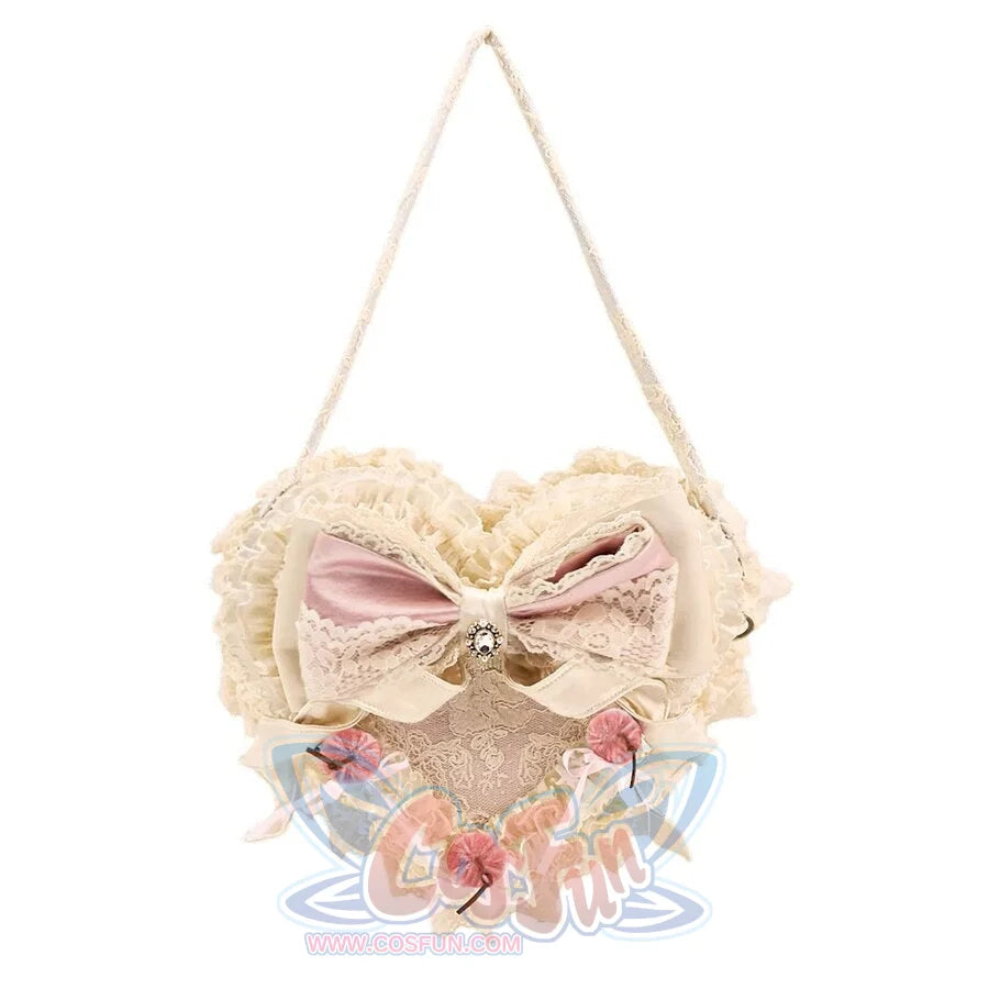Pink heart cake handbag flat lay with lace ruffles, satin bow, and cherry accents